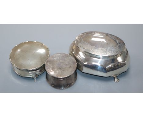 Three assorted early 20th century silver trinket boxes, including one with engraved lid, largest 13.5cm.