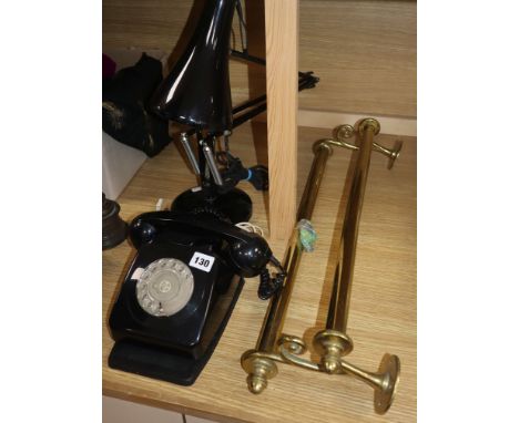 An angle poise lamp, a bakelite telephone and a brass towel rail (3)
