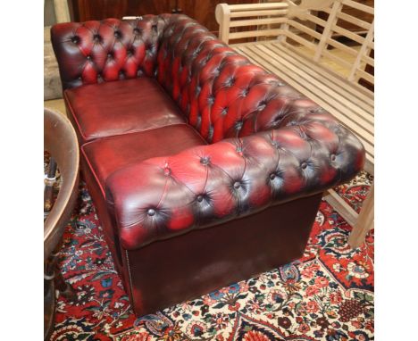 A leather button back chesterfield W.160cm