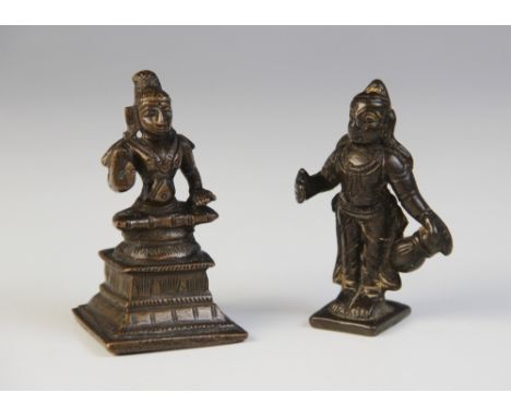 A South Indian bronze figure of Parvati, Tamil Nadu (late 18th century), modelled standing holding a vessel, 7cm high, with a