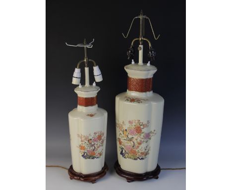 Two Japanese porcelain Kutani lamp bases, each of lobed baluster form and decorated with birds and branches, bayonet light fi