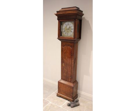 A George III oak cased eight day longcase clock, the caddy shaped hood with freestanding tapering pilasters flanking the 30cm