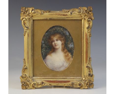 Pre-Raphaelite school (19th century),A bust length portrait miniature depicting a young lady with flowing red hair,Watercolou