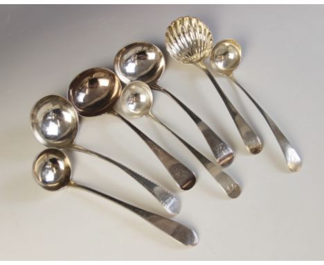 A selection of George III and later silver sauce ladles, to include; pair of George III Old English pattern sauce ladles, Edw