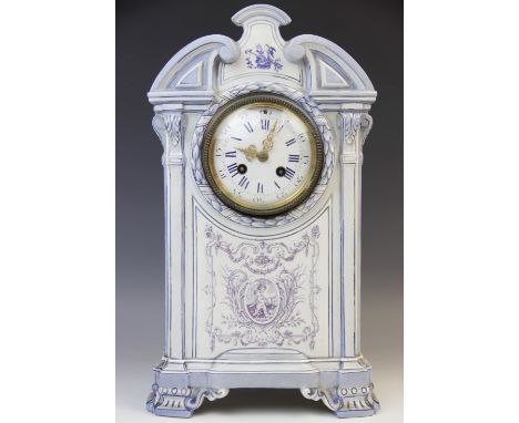 A late 19th century French porcelain faience clock signed 'Gien C M', the architectural shaped case highlighted with pastel s