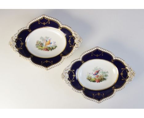 A pair of Royal Crown Derby dishes decorated by George Darlington, late 19th century, each of quatrefoil form on raised pierc