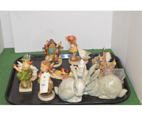 Six Hummel figures by Goebel; together with other figurines.