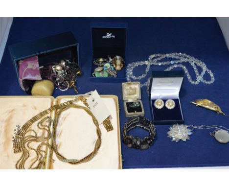 A bag of costume jewellery, including: a 19th Century green stone ring; marcasite jewellery, Swarovski; Ciro and other items.