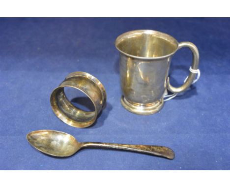 Silver christening set, by CE, Sheffield, 1937, comprising cup, spoon and napkin ring, in fitted case.