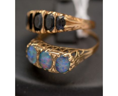 A three stone opal triplet ring; and a five stone sapphire ring, both on 9ct yellow gold shanks.