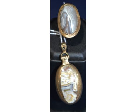 A bloodstone and agate set yellow metal locket pendant; and a agate set ring, yellow metal mount and shank.