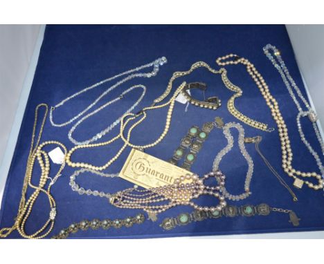 Costume jewellery, including: a faux pearl, white and purple stone bracelet, set in white metal; other faux pearls; and Egypt