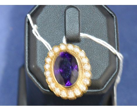 An Edwardian style amethyst and pearl brooch, in 9ct yellow gold mount.