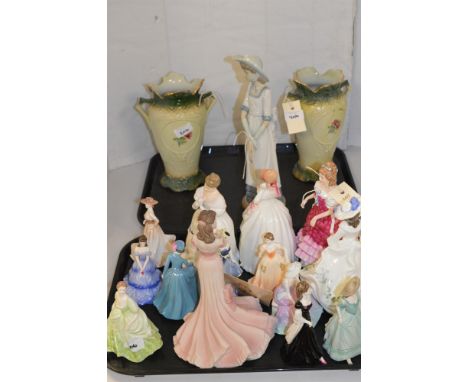 Fourteen Coalport and Royal Doulton figures; a Nao figure and a pair of Staffordshire vases.