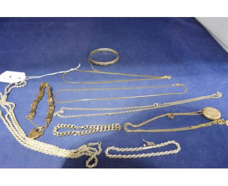 Gilt metal chain necklaces, white metal chains and bangle, and other items.