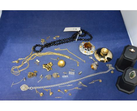 A bag of jewellery, including: two silver rings; a white stone ring the shank stamped '18k'; a French jet necklace; cufflinks