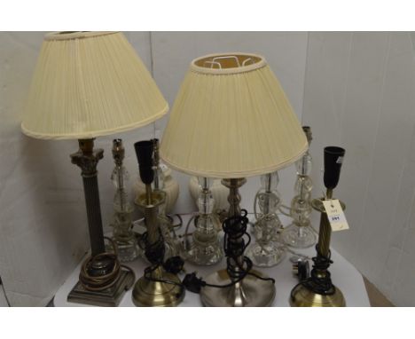 Table lamps, to include: five crystal style table lamps; a pair of metal column style lamps; two further metal table lamps; a