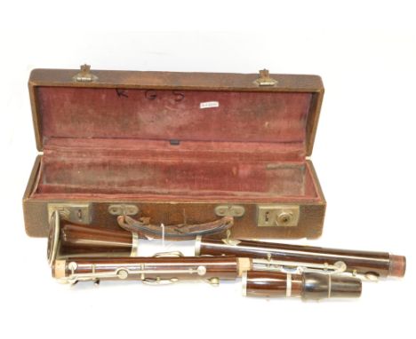 An E J Albert rosewood clarinet , made in Brussels for J R Lafleur, London, in three sections with nickel silver keys, cased.