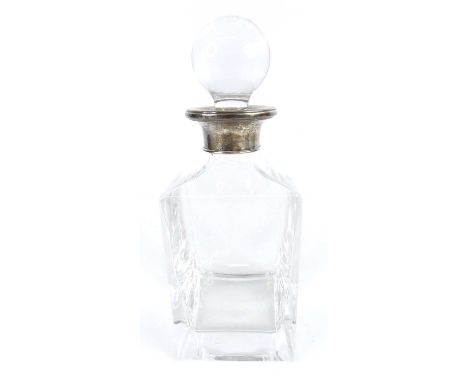 A circa 2000 heavy clear glass and silver collared decanter and stopper, of plain square-sided form, the collar maker Broadwa