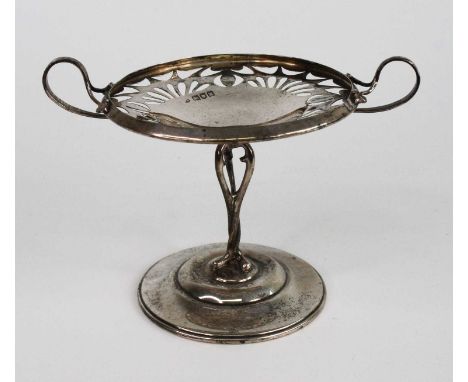 An Art Nouveau silver twin handled bonbon dish, with pierced detail, stylised handle and column, upon a circular spreading fo