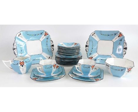 An Art Deco Shelley 12-place bone china tea service in the 'Queen Anne' shape, decorated in a rare powder blue colourway, flo