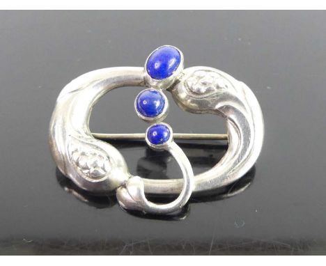 Georg Jensen - a stylised silver and lapis lazuli cabochon inset model No. 77 brooch, stamped marks verso, 2.5 x 3.2cm, 4.8g