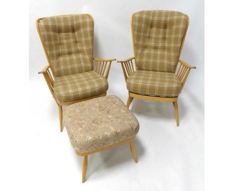 A pair of Ercol blond elm Windsor stickback armchairs, each on turned supports united by stretchers, with chequer cloth fabri