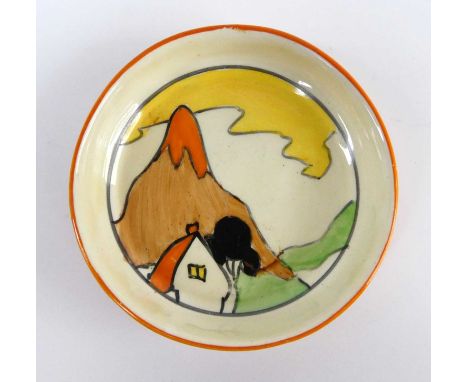 A 1930s Clarice Cliff Mountain pattern pottery circular coaster, bright colour decorated with black printed 'Nasturtium Bizar