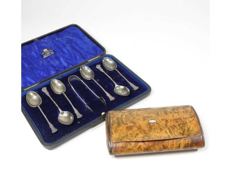 A 19th century burr yew snuff box, of oval shape, with a hinged lid, 13cm wide, together with a cased set of silver teaspoons