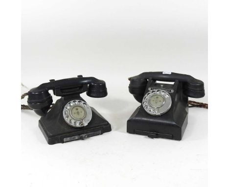 A vintage black bakelite telephone, together with another (2)