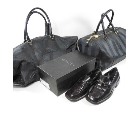 A pair of Gucci men's brown leather loafers, with horse bit detailing, size 40.5, boxed, together with two Fendi holdalls (3)