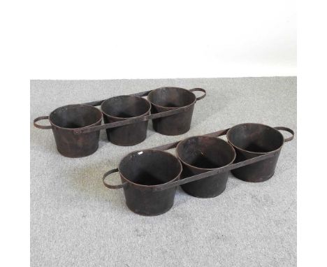 A triple planter, together with another, 107cm wide (2)