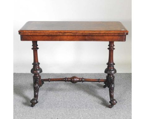 A Victorian walnut burr walnut and inlaid folding card table, on a carved stretcher base96w x 48d x 74h cm