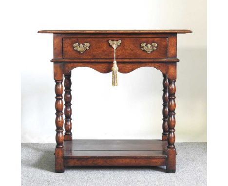 A 17th century style oak side table, 20th century, on bobbin turned legs77w x 46d x 73h cm 