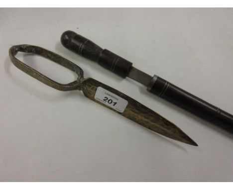 Middle Eastern brass dagger with engraved decoration, together with another dagger with wooden scabbard