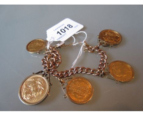 Two Victorian 1899 full sovereigns and three Victorian half sovereigns, two dated 1853, one 1865 on a 9ct gold chain with loc