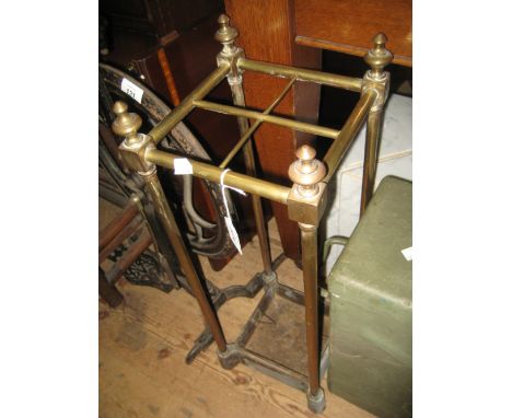 Edwardian brass and iron four division stick stand