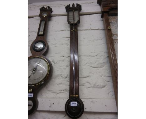 18th Century walnut and chequer line inlaid stick barometer, the architectural pediment above a silvered dial with single adj