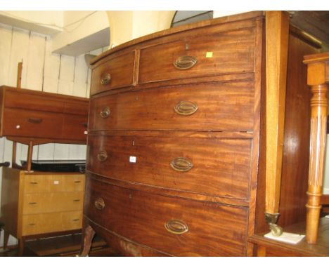 19th Century mahogany bow front chest of two short and three long drawers with oval brass handles on splay bracket feet