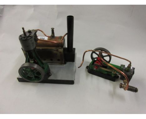Small Stewart type green and red painted stationary engine with copper boiler and aluminium base together with another simila
