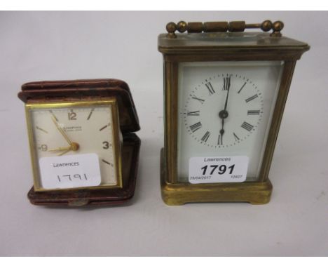 Small gilt brass cased carriage clock with enamel dial, Roman numerals and single train movement, together with a Looping tra