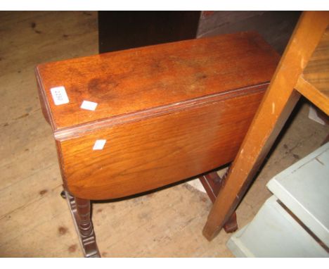 Smaller drop-leaf Sutherland table on twin end turned supports together with an oak four shelf wall bracket