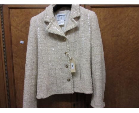 Two Liberty silk scarves and two other scarves, Chanel ladies jacket with original receipt, spare cloth and button, size 42