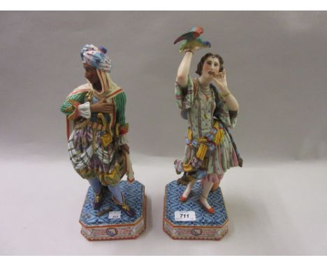 Pair of 19th Century French bisque figures, a Moorish couple, signed with blue seal marks to bases, 14ins high (slight damage