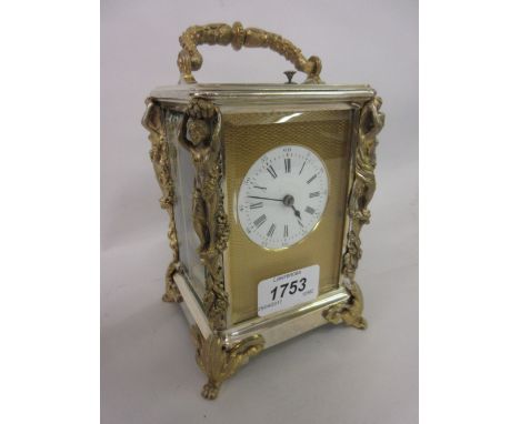 19th Century French silvered brass cased carriage clock with caryatid corner pilasters, the engine turned dial surround enclo