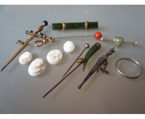 Victorian silver gilt miniature sword, four small cameo portrait plaques, two jade brooches, three stick pins and a small qua