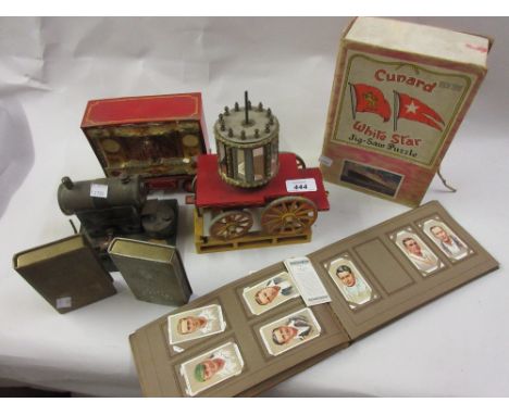 Mamod stationary steam engine, model of an organ with cart, two post office savings banks, album of cigarette cards and a box