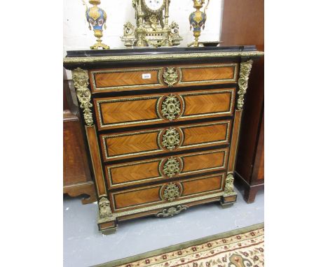 French late 19th / early 20th Century kingwood and gilt ormolu mounted commode chest of five drawers on low square supports, 