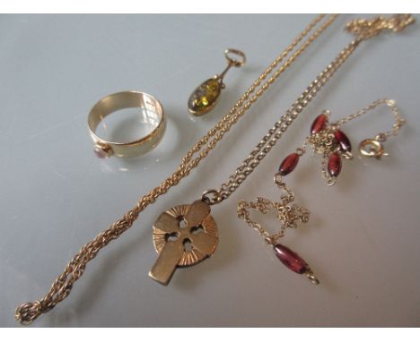 9ct Gold and moonstone ring, a 9ct gold and bead chain necklace, a 9ct gold Celtic cross and chain and a 9ct gold pendant and