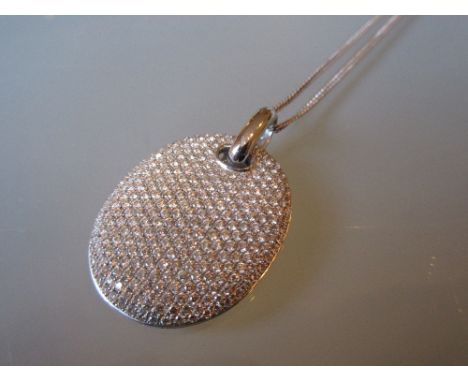 Large oval 18ct white gold pave diamond set pendant, approximate total weight 3.30ct, on an 18ct white gold chain